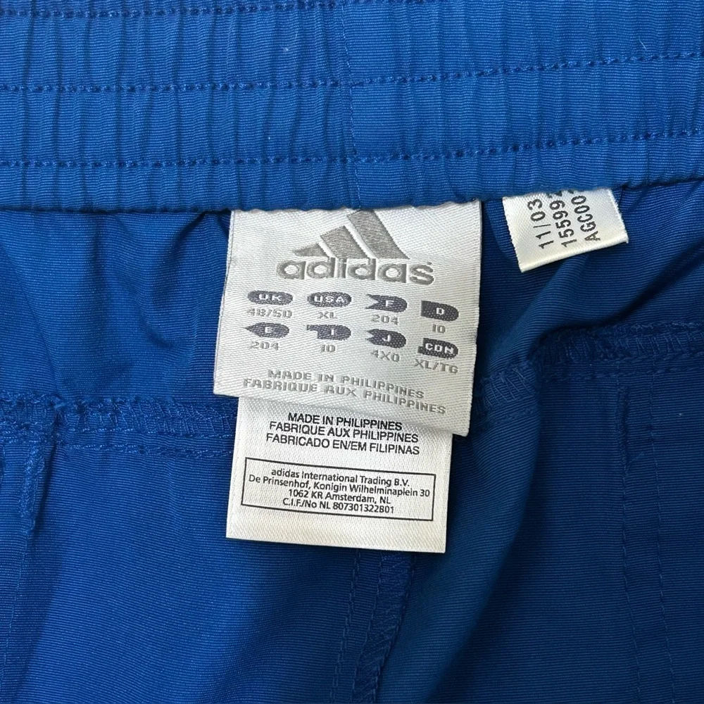 Adidas XL Convertible to shorts and adjustable waistband Snap and zipper closure